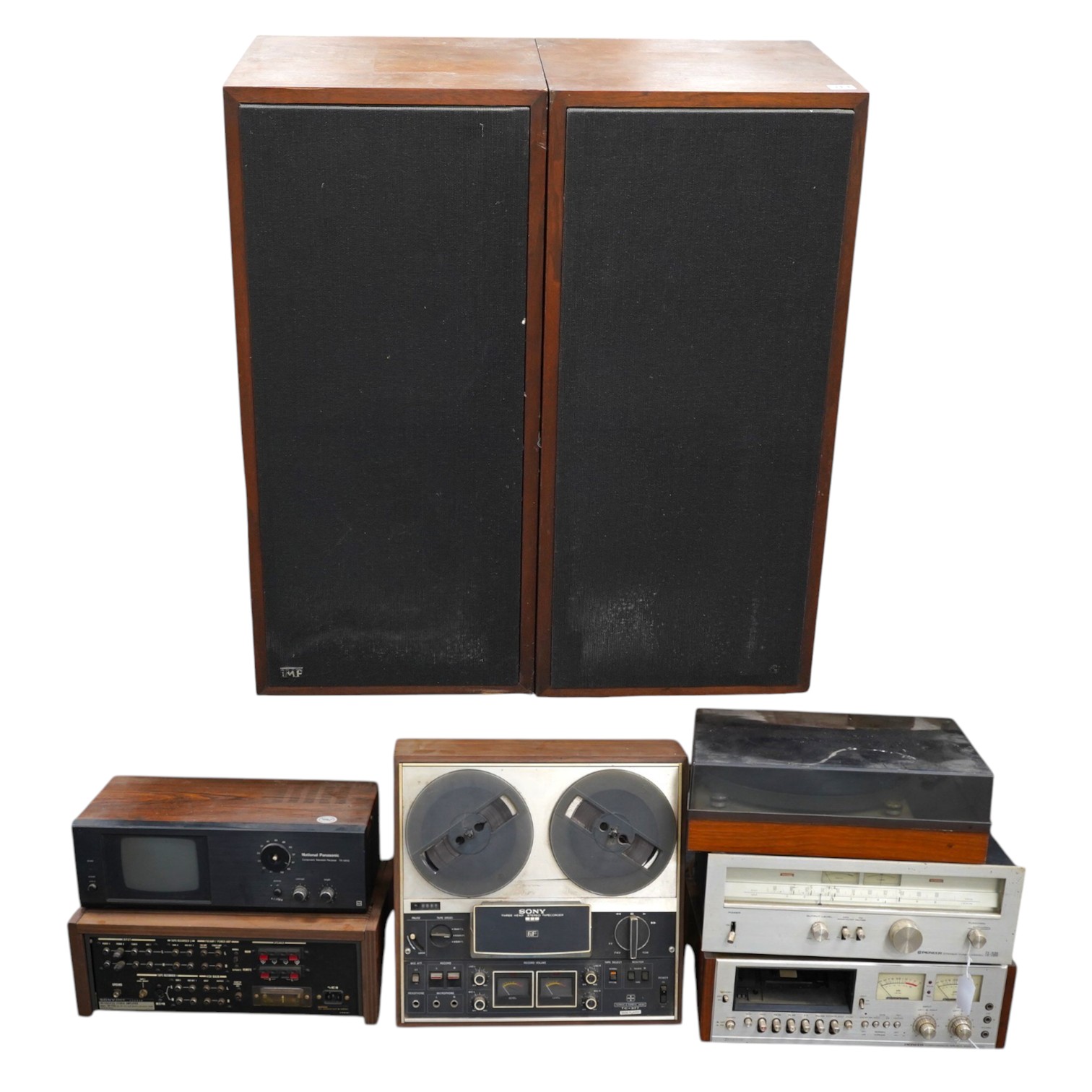 A pair of floorstanding IMF speakers, together with a Sony three-head reel to reel tape recorder, a National Panasonic compact television TR-565G, a Sony integrated stereo amplifier TA-1150, a turntable, a Pioneer tuner